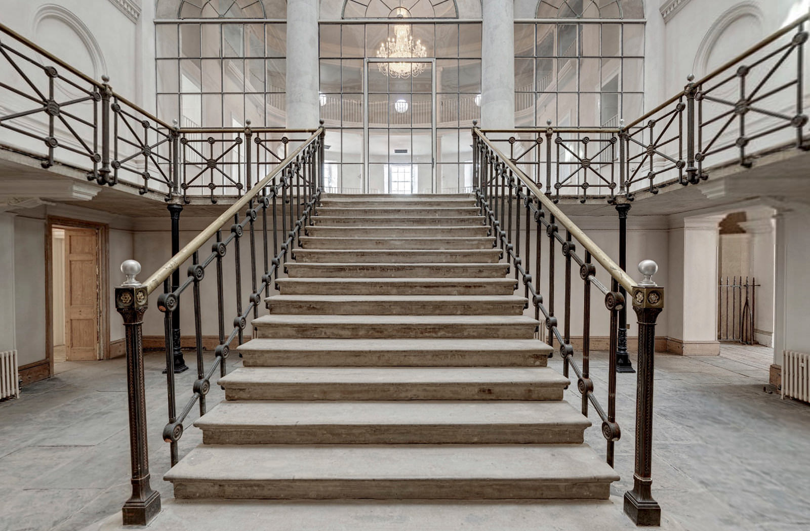 View looking up the grand staircase at Old Sessions House in London.